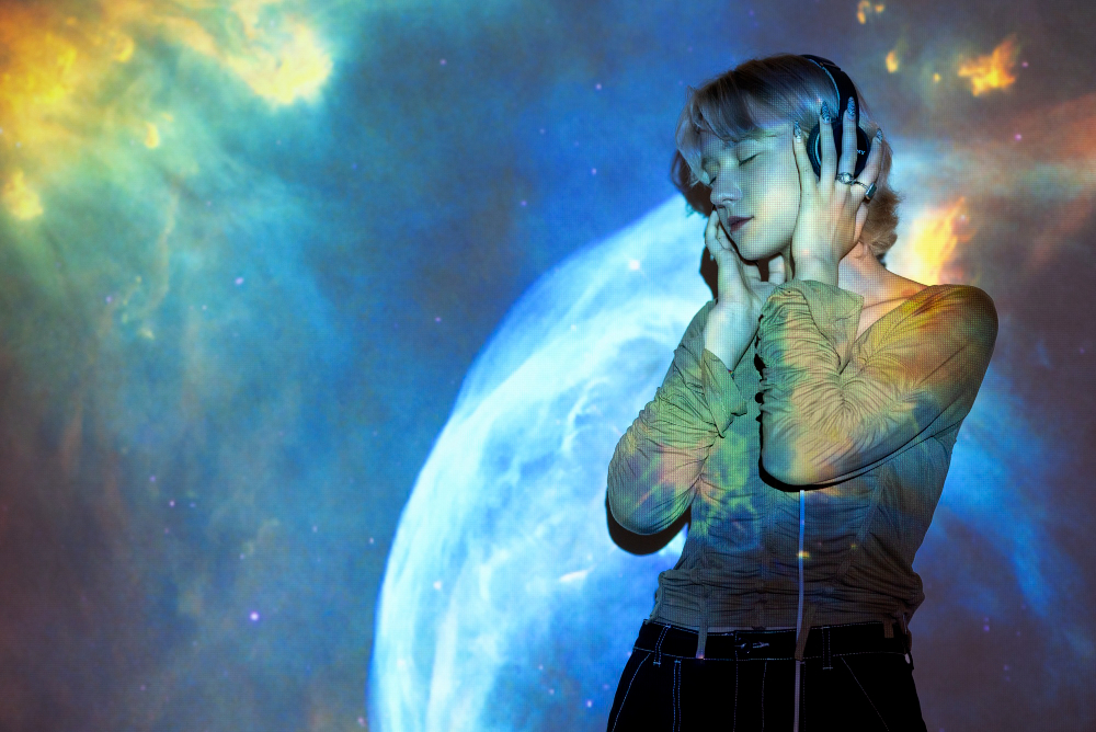 Portrait of woman posing with universe projection texture Related tags